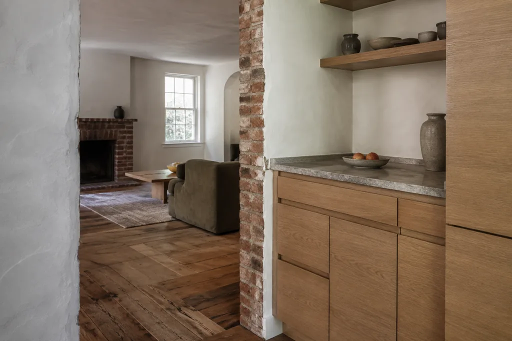 A renovated interior where original masonry meets new joinery